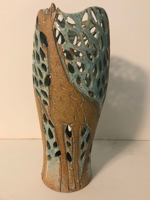 Iamge of Giraffes, Ceramic 11”x5” $230